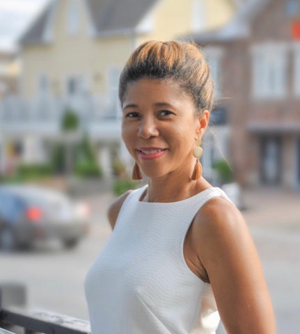 Corporate wellness and health coach Maxine Choy, a certified yoga instructor dedicated to holistic health.