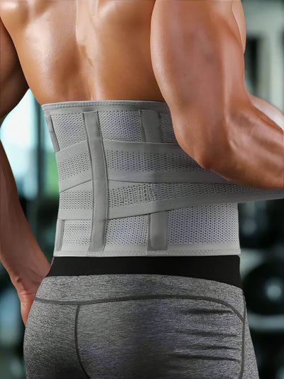 Adjustable unisex lumbar support belt worn at the gym, providing enhanced stability and comfort.