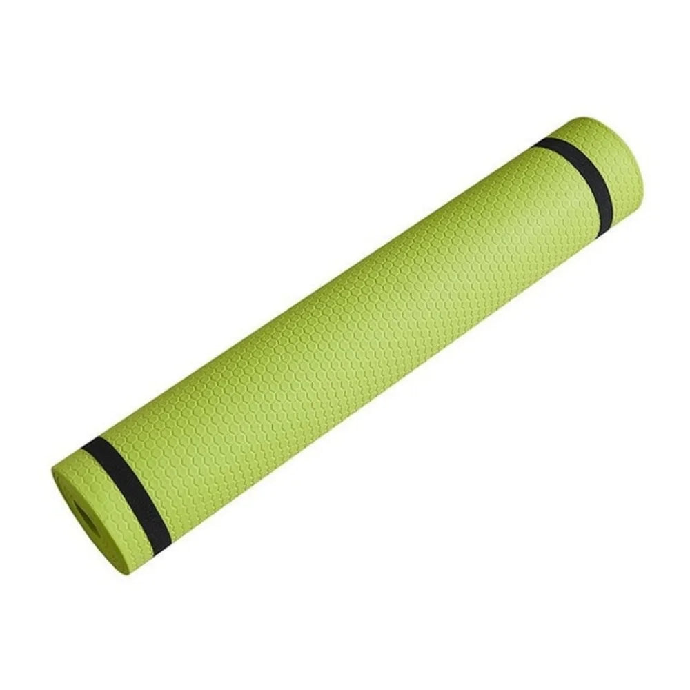 Rolled-up green yoga mat