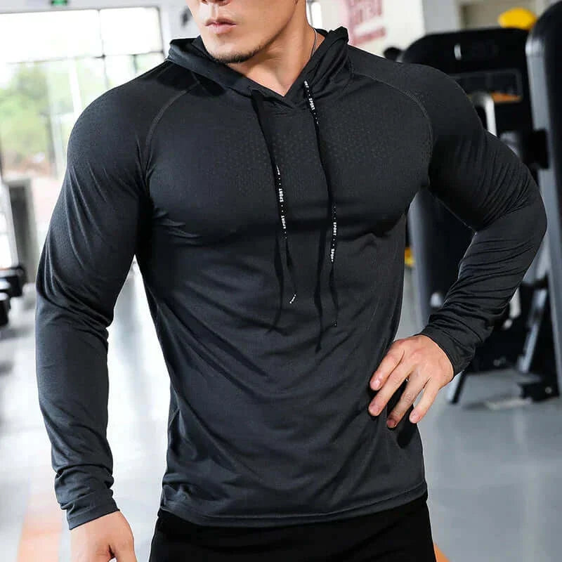 Men's fitness tracksuit with stylish hoodie and joggers for ultimate workout.