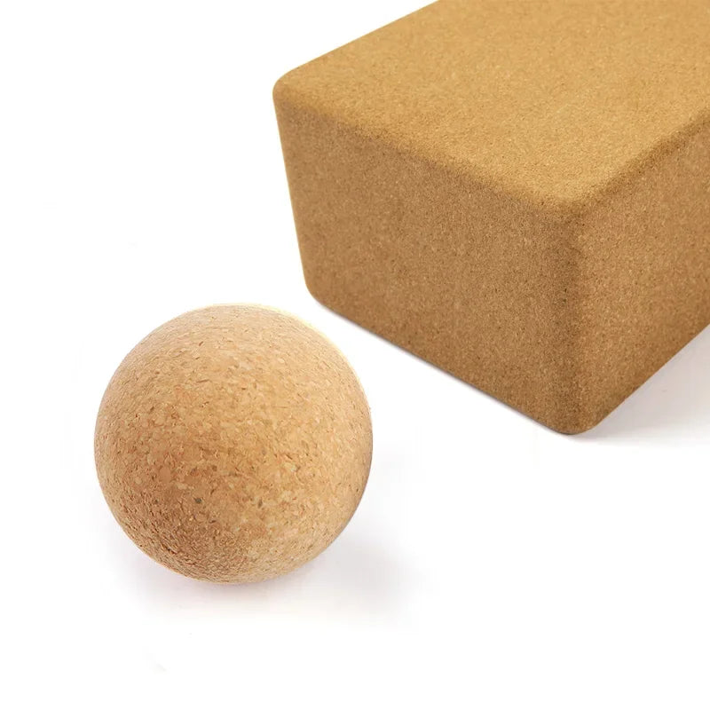 Eco-friendly massage ball and cork yoga block set for muscle recovery and flexibility.