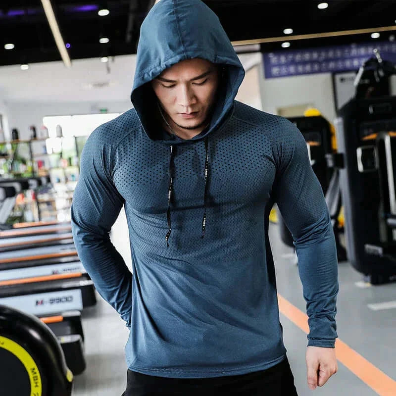 Men's fitness tracksuit with stylish hoodie, ideal for workout and casual wear.